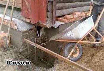 Опускание сруба после ремонта фундамента